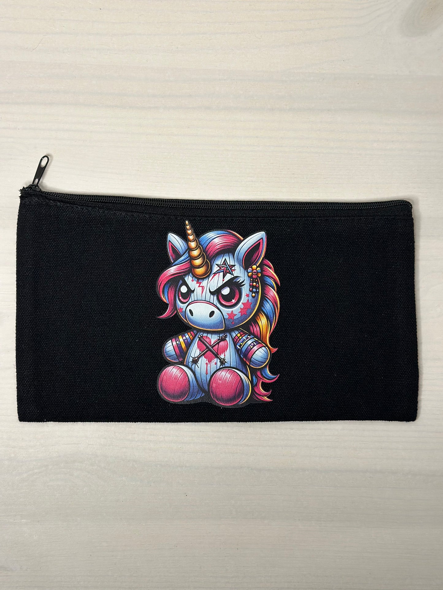 TÄSCHCHEN „SITZENDES EINHORN“